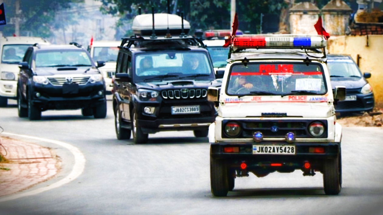 Security forces convoy led by Jammu and Kashmir Police vehicle during heightened security review in Jammu.